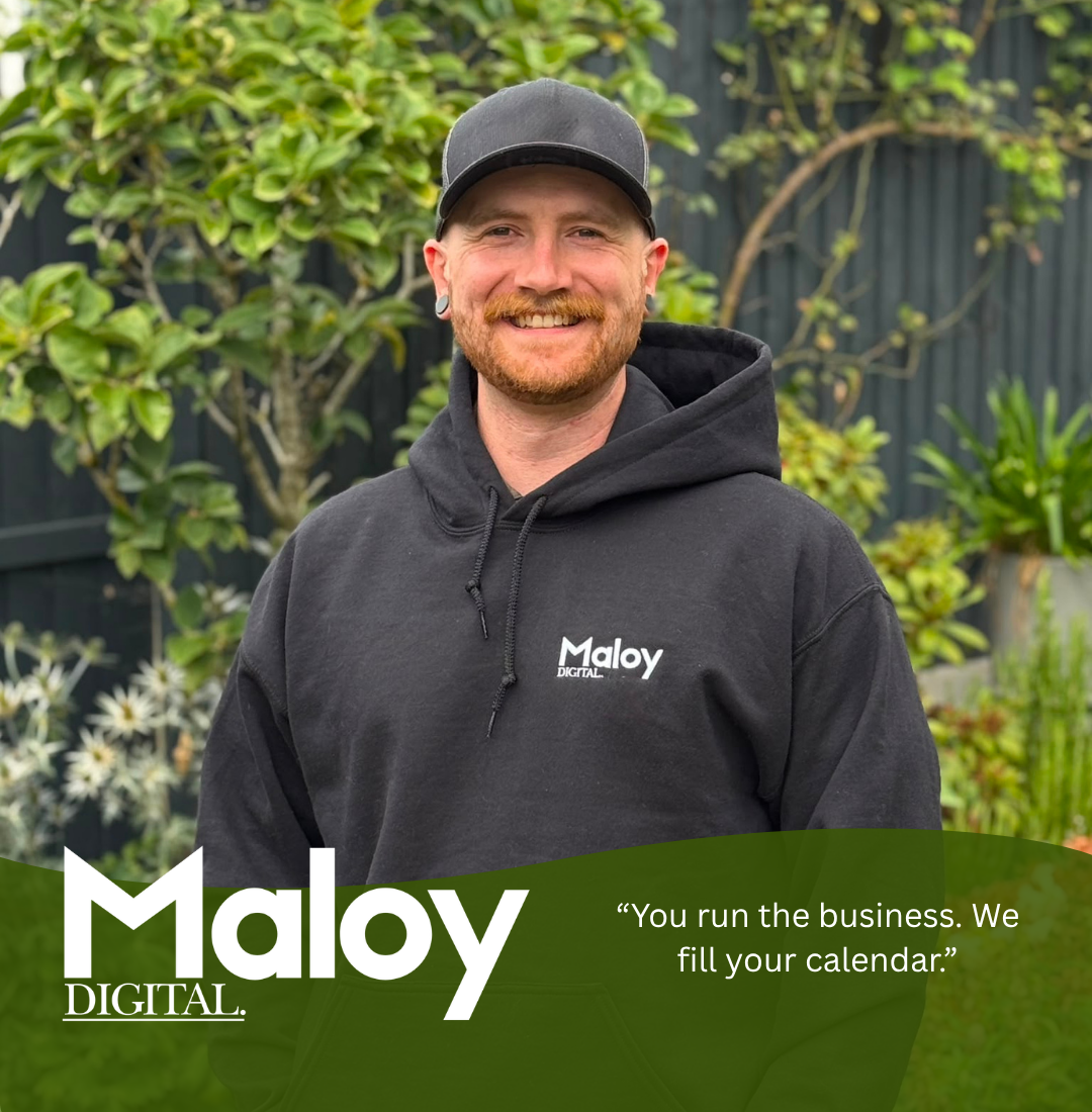 Maloy Digital founder in a branded hoodie